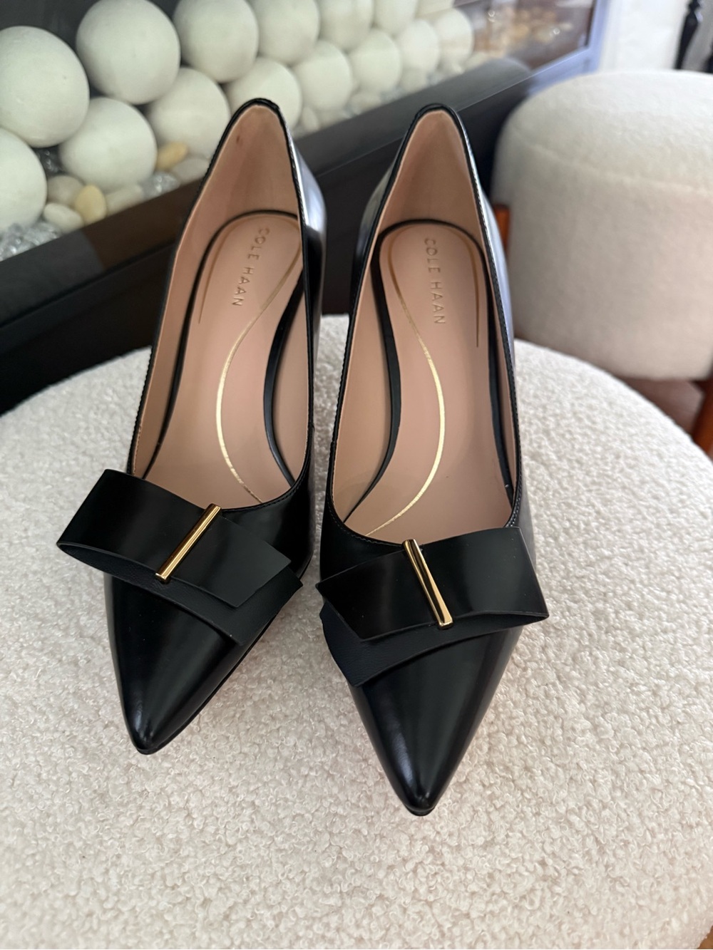 Cole Haan Black Pointed Toe Bow Pumps with Gold Accent